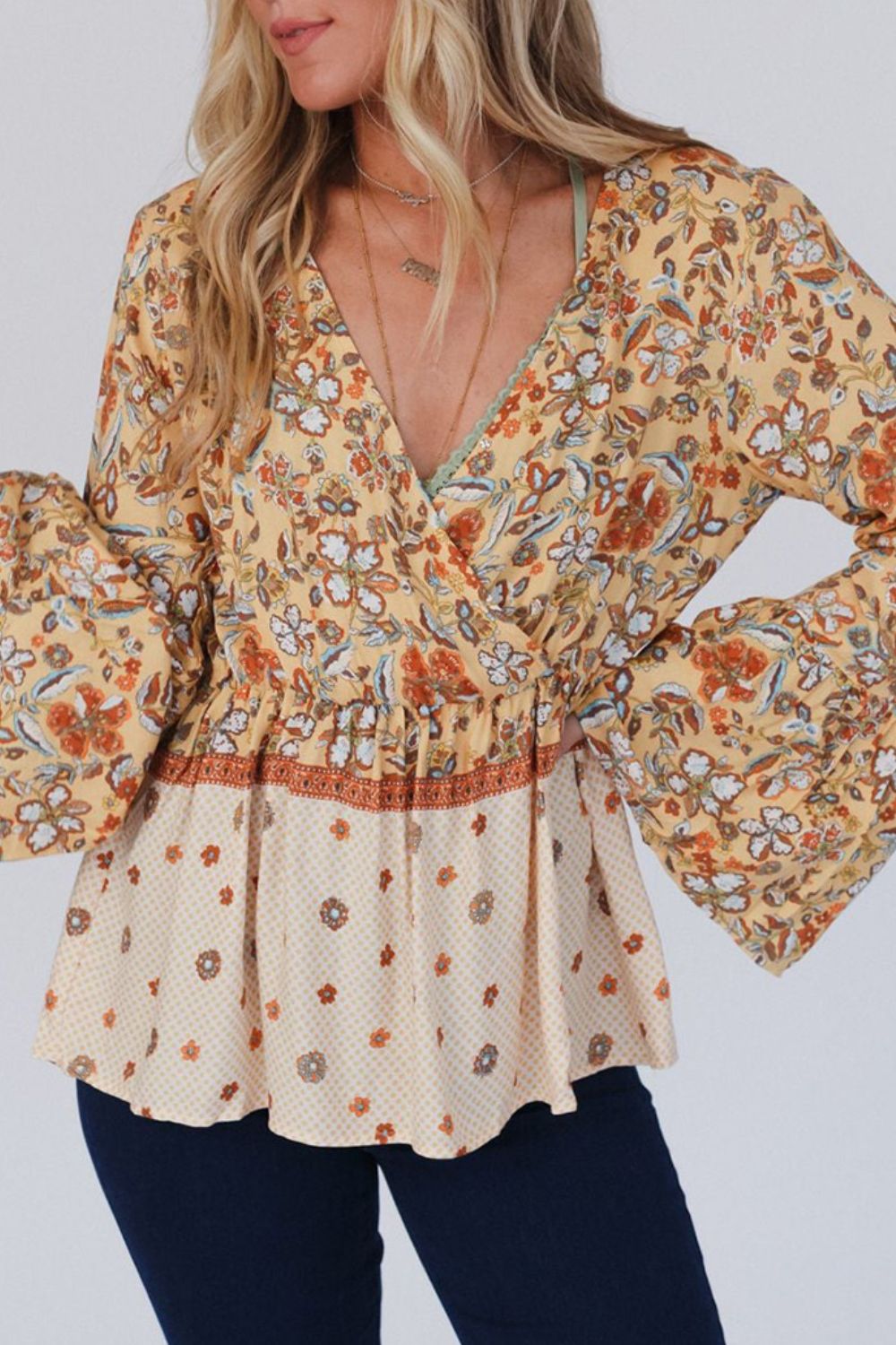 Peplum Printed Surplice Flare Sleeve Blouse